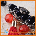 Nya 2015 hög kvalitet partihandel smycken röd bomull tofs svart pärlor halsband