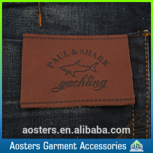 Custom design pu embossed leather label for garment