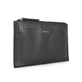 Porte-monnaie en cuir verni noir brillant avec rivets