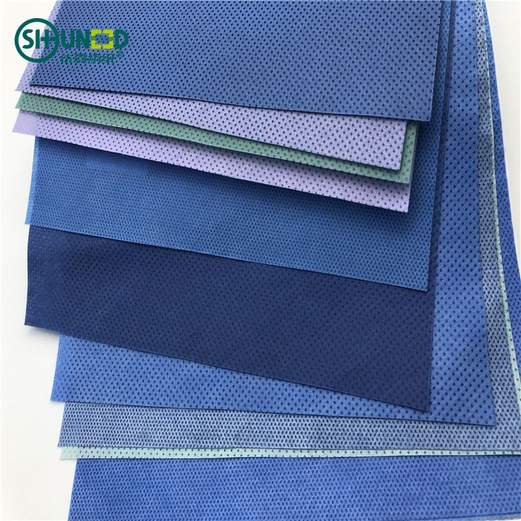 Stock SSMMS, SMS ,SMMS Meltblown Nonwoven Fabric Light Blue 28 Tons 100% Polypropylene Oeko-tex 100% STANDARD Blue and White DOT