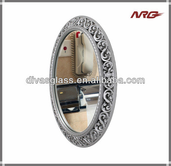 Ornately carved mirrors