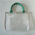 Bolso cosmético blanco, hecho de PVC, con mango verde, disponible en varios colores