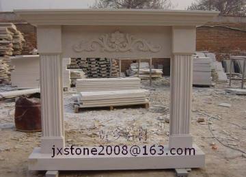 white sandstone fireplace