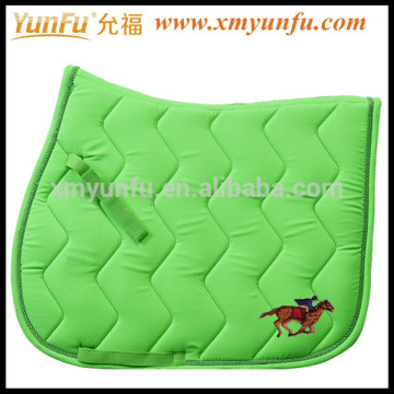 Horse used to Lime green saddle pad