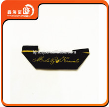 mitre fold fashion designer woven clothing label