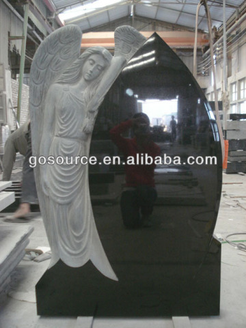 black granite tombstone with etching angel