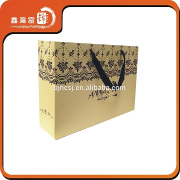 Wholesale personalized slogan customized paper bag