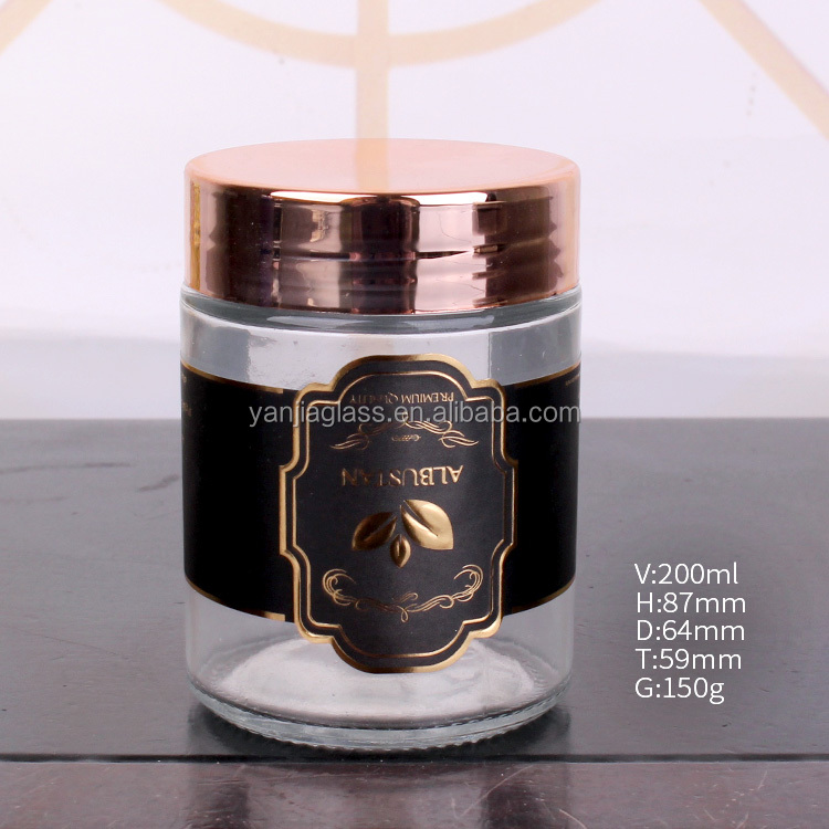 cheap cylinder 200ml glass jar with customized logo round glass jar with rose gold lid