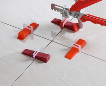 Tile laying leveling tool
