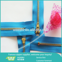 Good quality copper material zipper gold auto lock metal zipper finished