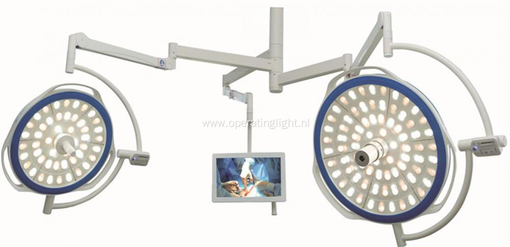 Dual lamp head led light with camera system