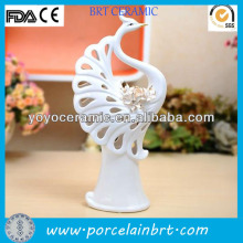white peacock shaped ceramic engagement decorations indian weddings