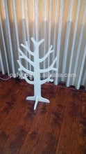 White wooden coat tree prosperity tentacles