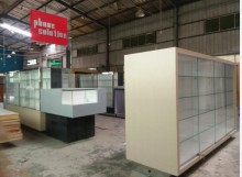 Customized cellphone cases display kiosk with LED light