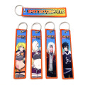 Anpassad anime Jet KeyChain Tyg Woven Tag Keychain