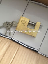 gold coated rectangular padlock fixed with vane key