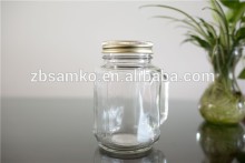 Clear square glass beverage jar with handle and scale