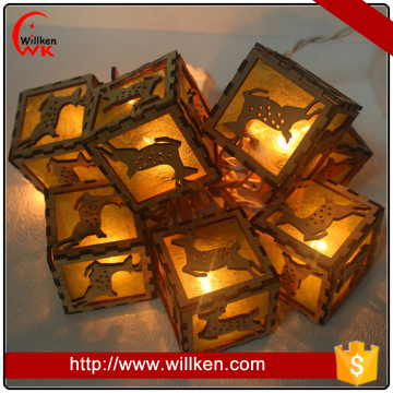 Woodcut deer shape holiday worksite string lights