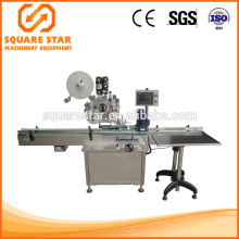 High speed automatic top labeling machine