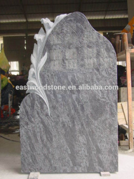 carving flower in headstone poland tombstone