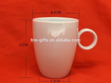 white porcelain mug with handle
