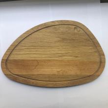 Wood cutting board with juice groove