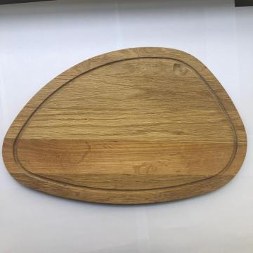 Wood cutting board with juice groove