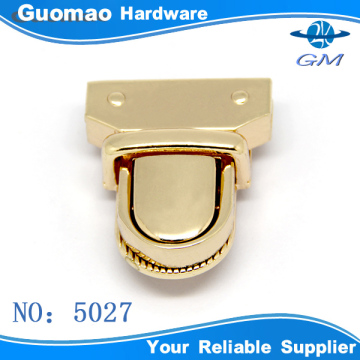 hand bag gold hardware press lock