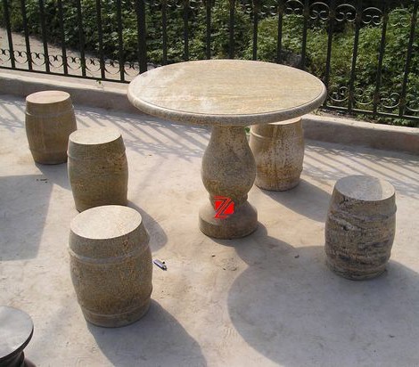 round stone table with chairs
