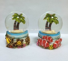 water filled glass globe with detailed colourful resin figurine 65mm