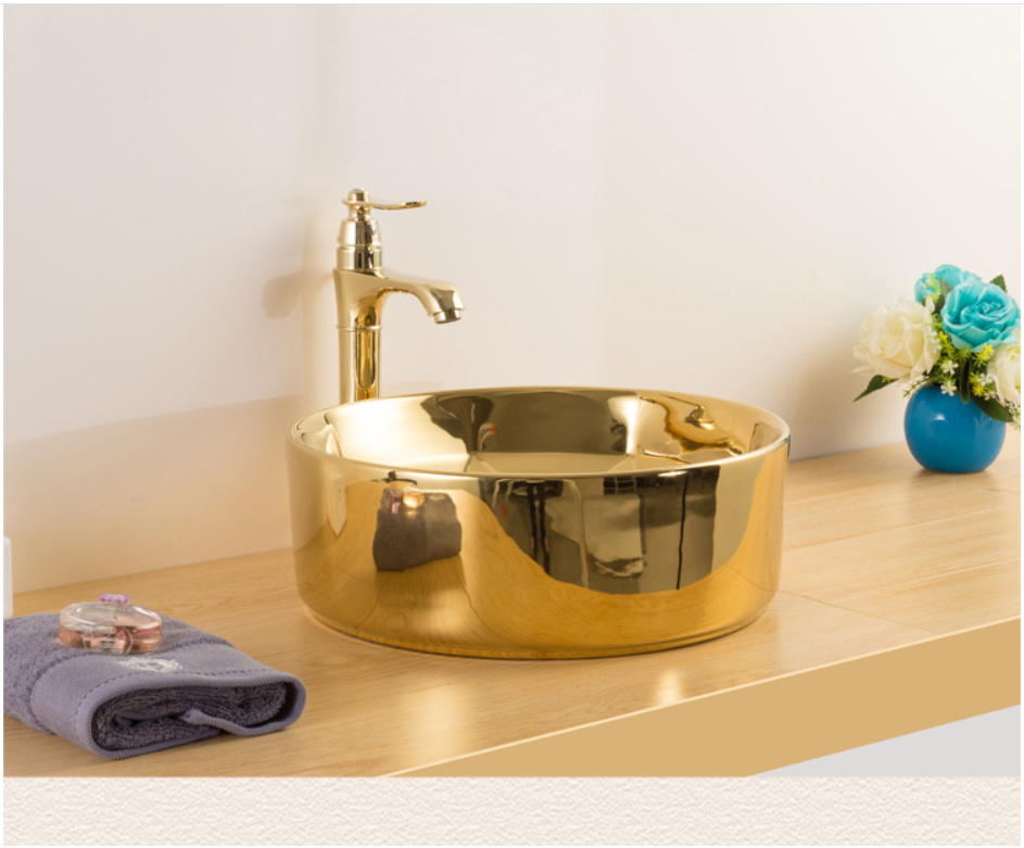 Lavabo redondo de baño mayorista de cerámica de lujo de color dorado y negro con lavabo de encimera nuevo diseño de lavabo de arte