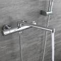 Wall mounted double hole mixer with hand shower