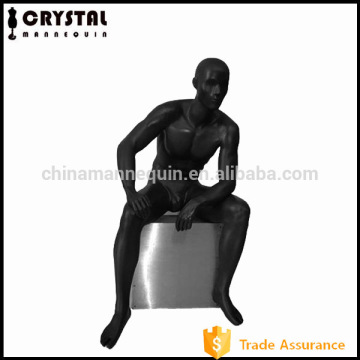 sittting black muscle man mannequin for sports
