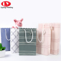 Solid color carrier portable paper bag with wavy