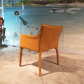 Upholstery saddle leather dining chair by EOOS