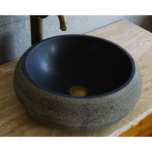 Round honed natural black lava sink