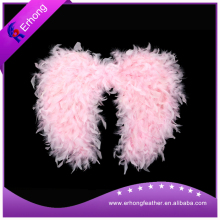 Pink feather wings for party decorations