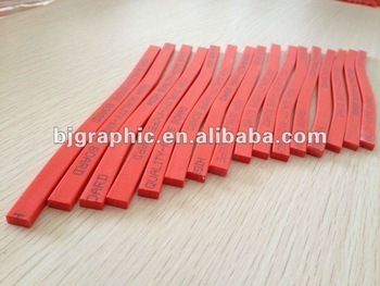 Red plastic wavy cutting stick