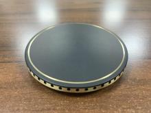 Copper burner cap with black enamel