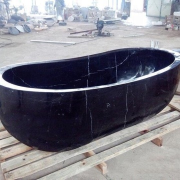 Black marble bathtub and hand carved stone bathtub