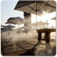 Adjustable pressure cool misting system