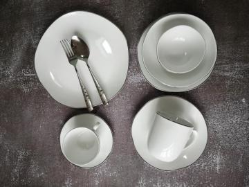 Porcelain dinner set with silver-rim
