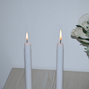 Taper white candles for religion and decoration