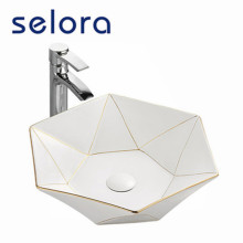 Керамическая белая раковина для ванной комнаты с золотым тазом