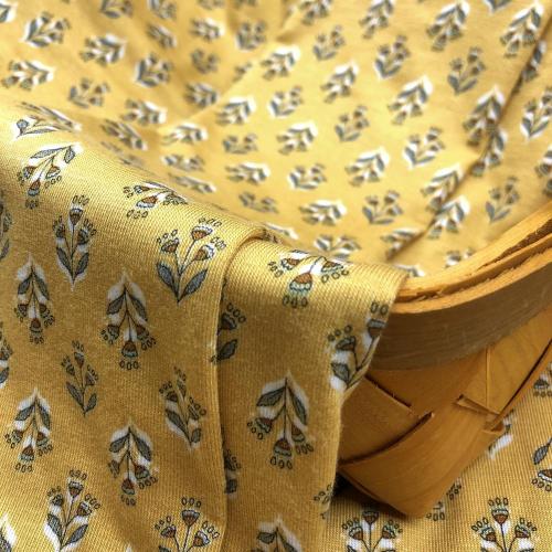 Joli motif de feuille de base jaune sur tissu de viscose