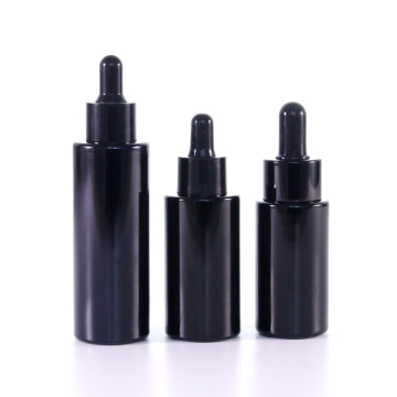 Black glass serum bottle with black dropper