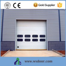 electric workshop gate with windows and person entry door