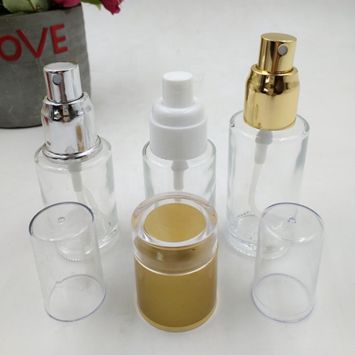 Clear glass cosmetic spray bottles with PP caps