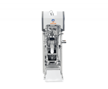 Vertical impeller type chemical packaging machine