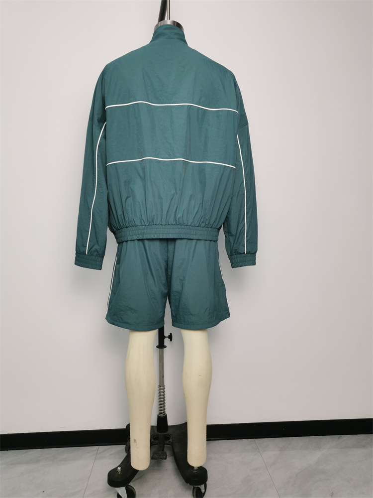 Sportswear chaqueta de manga larga con traje de recreación de pantalones cortos